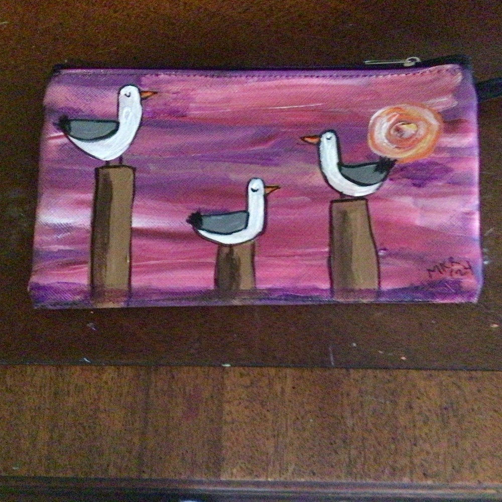 Handpainted wristlet with funky Seagulls.